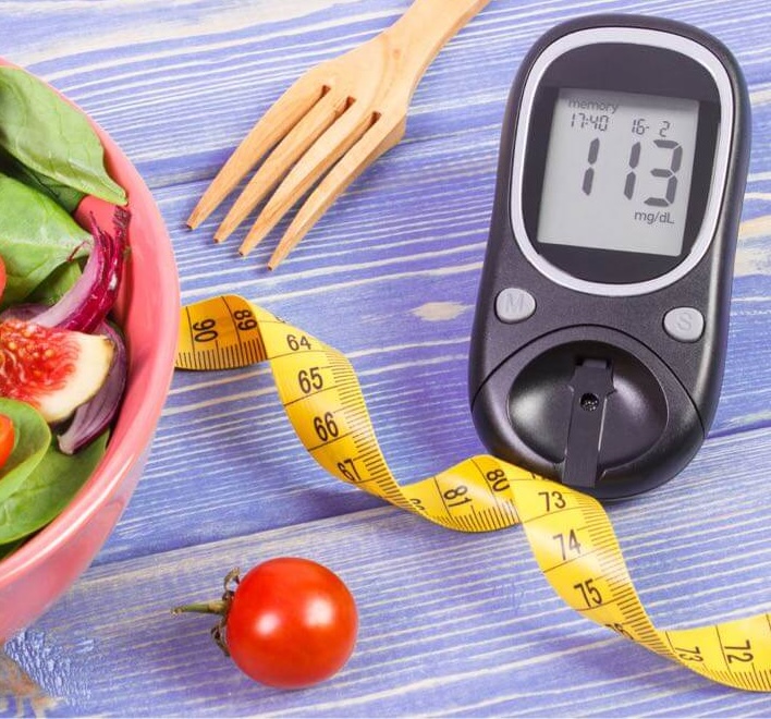 insulin measure of 113 with a tape measure around it